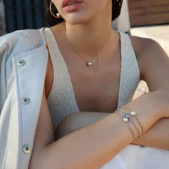 Majorica Pulsera Encadenada Nuada En Acero Dorado Y Perla Blanca| Pulseras Encadenadas